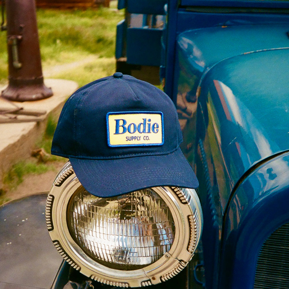 Coyote Snapback - Navy/Yellow
