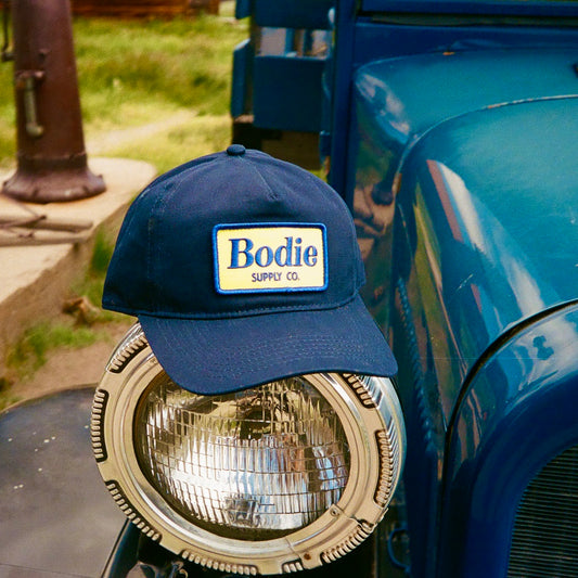 Coyote Snapback - Navy/Yellow